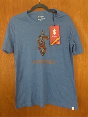 Cotopaxi Blue Short Sleeve Tee with Multicolor Llama Graphic
